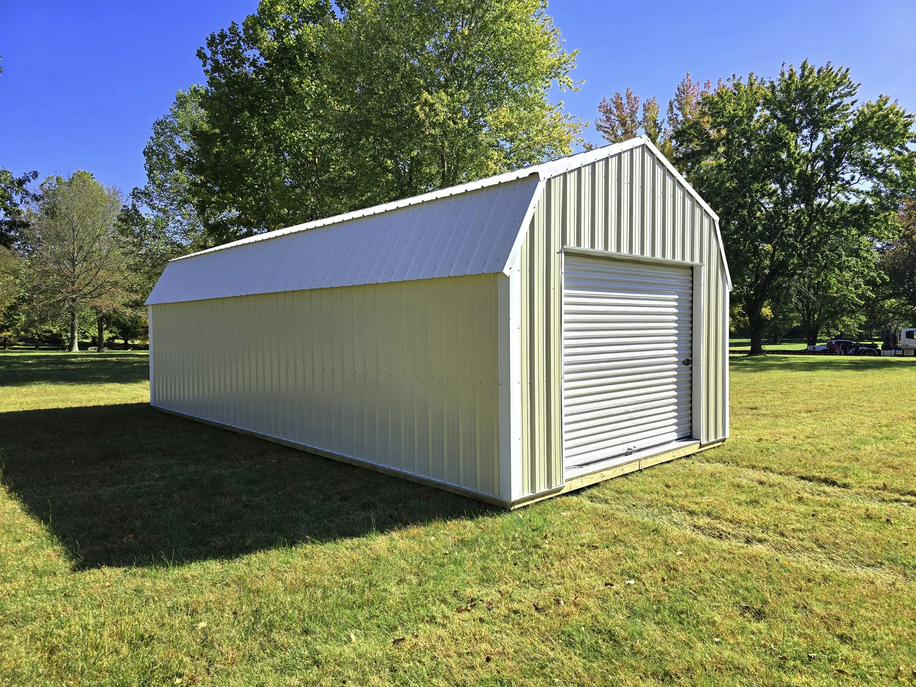 Lofted garage with a roll-up door